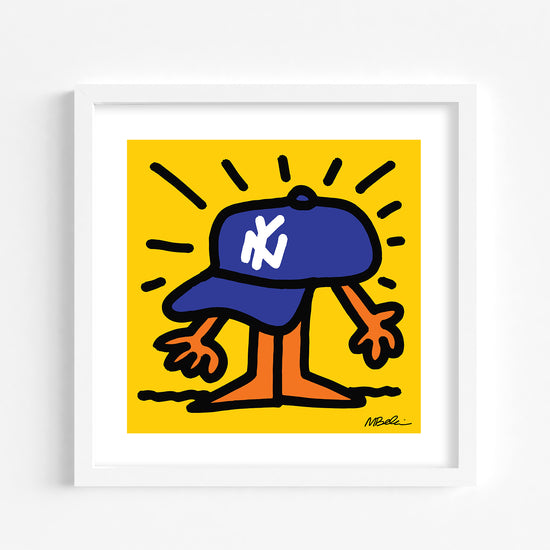 A framed art print featuring a stylized character wearing a blue hat with 'NY' text on it, against a yellow background.